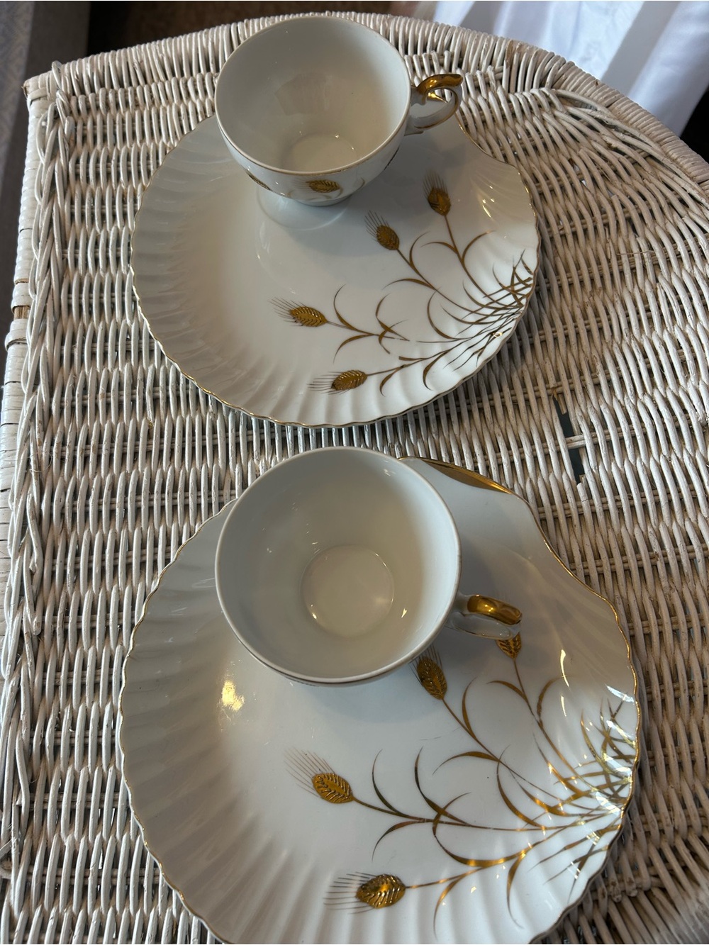 Lefton China tea cups and snack plates. 2 sets